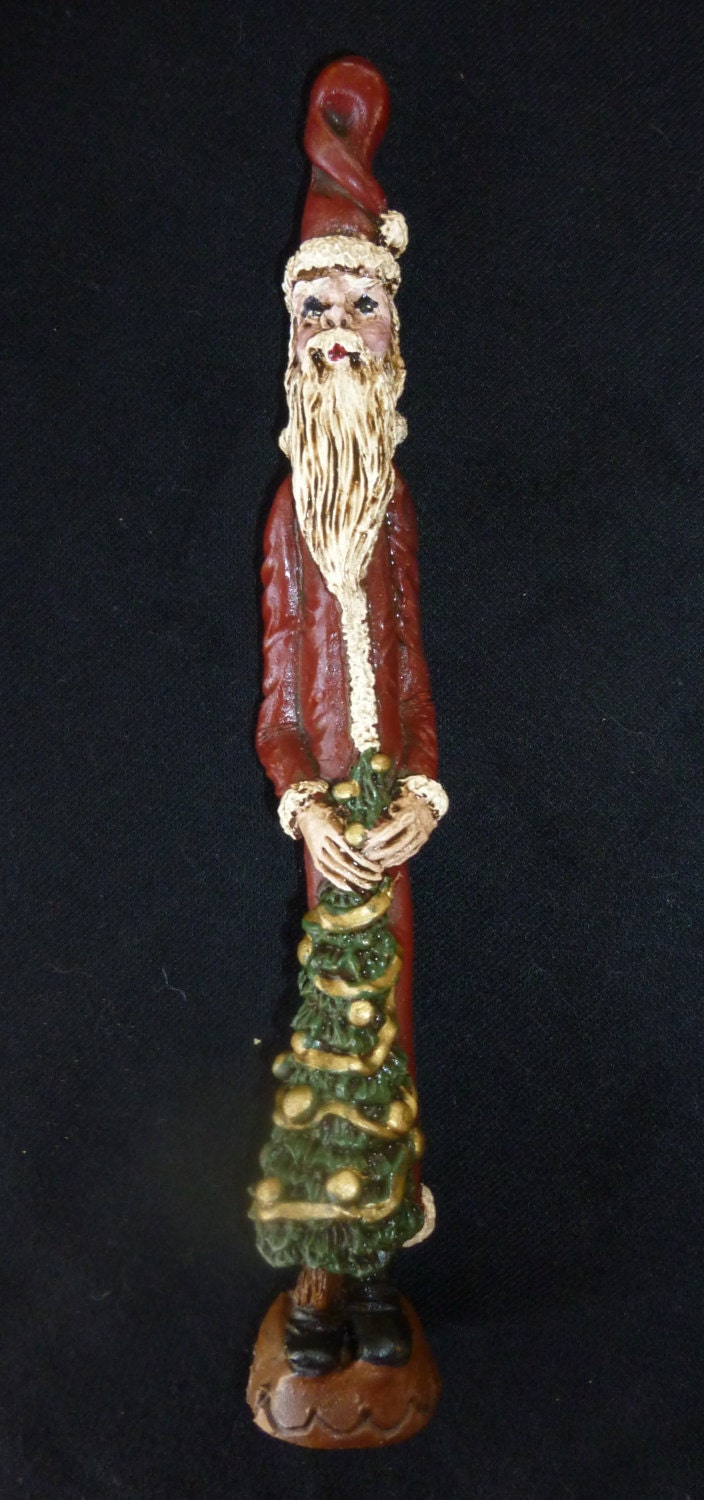 folk art santa figurines