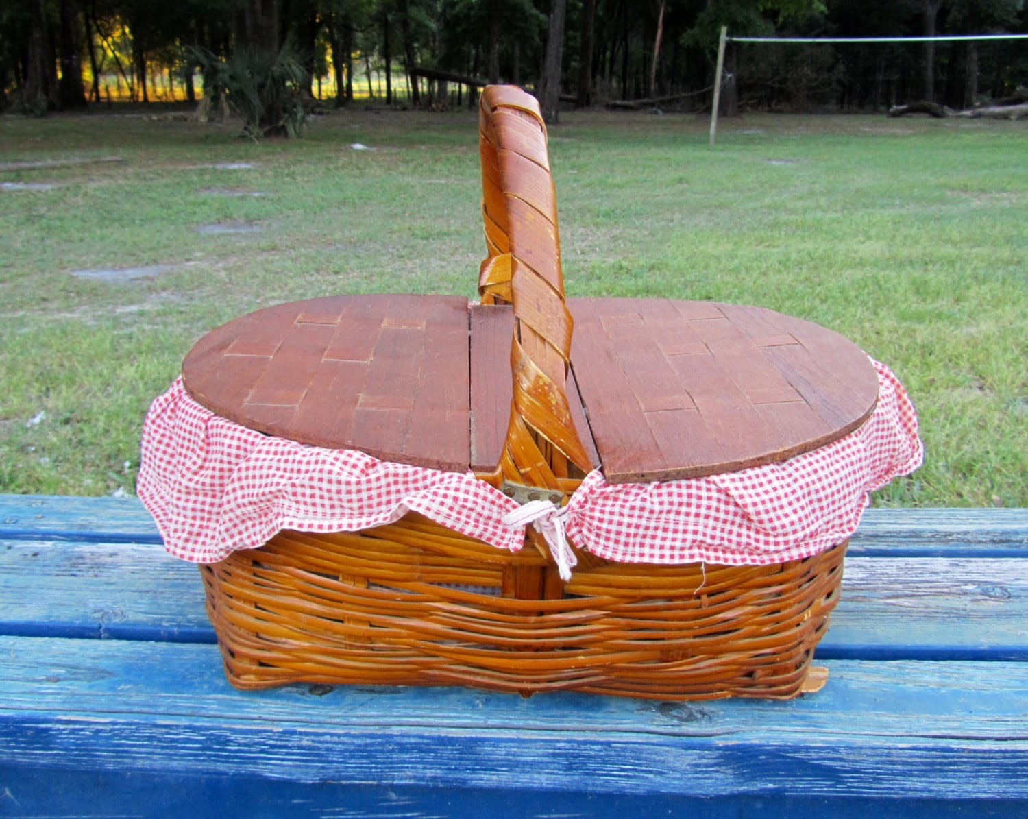 Vintage wicker woven wood picnic basket with wood double lid