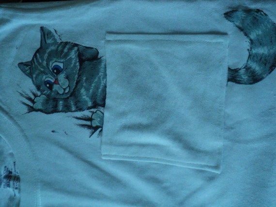 t shirt with cat coming out