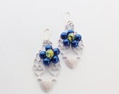White Metal and Flower Design Earrings Blue Flower With Multi Coloured Centre Bead White Metal Heart At Base Exquisitely Designed