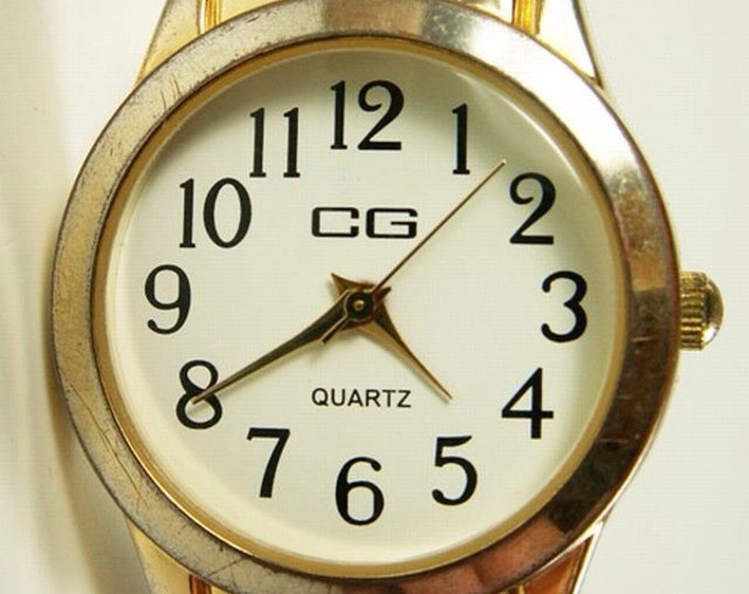 Storewide 25% Off SALE Vintage Ladies CG Designer Signed Gold Tone Quartz Watch Featuring Original Twist-a-Flex Adjustable Band