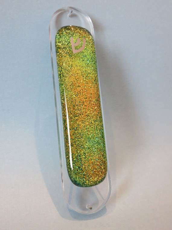 Glass mezuzah case in green, gold and coral dichroic glass with hand lettered 22K white gold shin