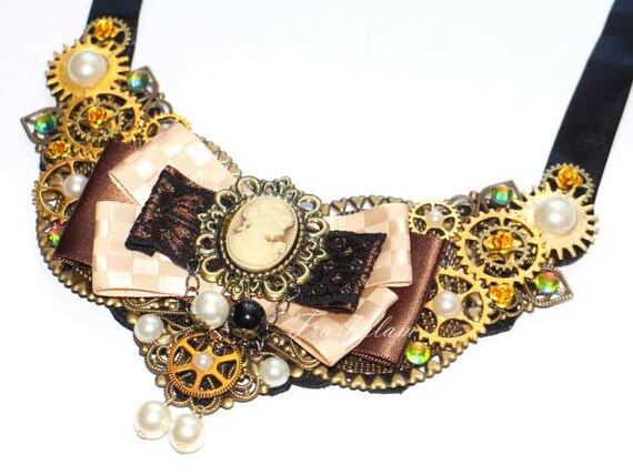 Steampunk neo Victorian cameo pearls and filigree mechanical cogs gold copper and silver Statement bib necklace Unique wearable art by HausofTrashglam steampunk buy now online Steampunk neo Victorian cameo pearls and filigree mechanical cogs gold copper and silver Statement bib necklace Unique wearable art by HausofTrashglam steampunk buy now online