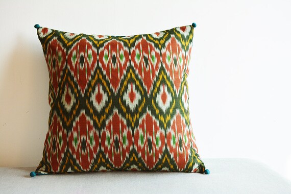 Dark Green and Red Woven Ikat Pillow with Graphic Pattern