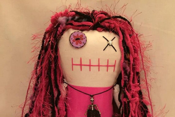 pink creepy doll