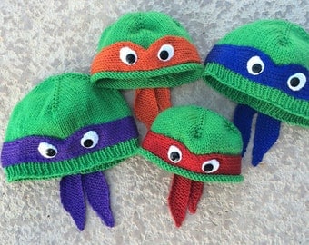 Hand-knit teenage mutant ninja turtle hat with ribbed or rolled bottom edge. COWABUNGA!