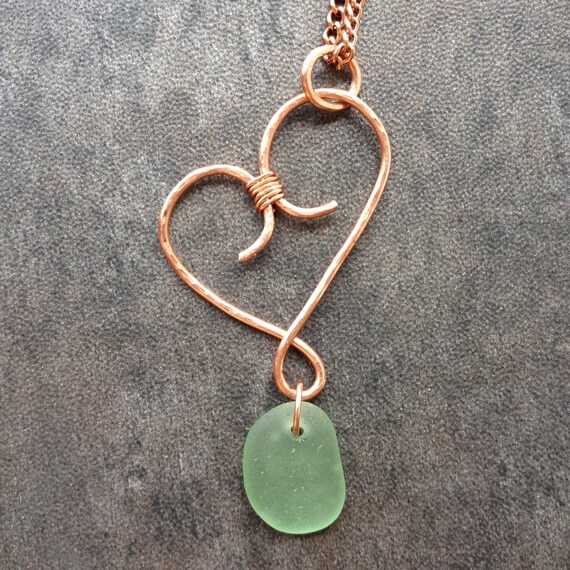 Wire wrapped hand hammered copper heart pendant with