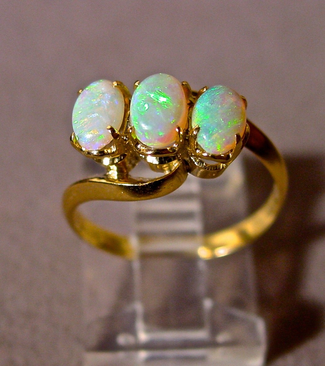 White Opal ring.10K Solid Gold w/ Three Genuine Australian