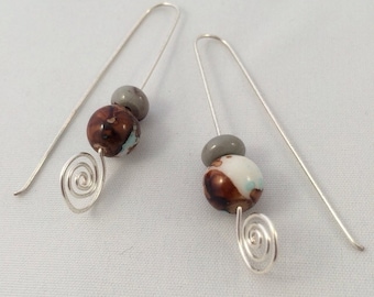 Silver spiral long drop earrings
