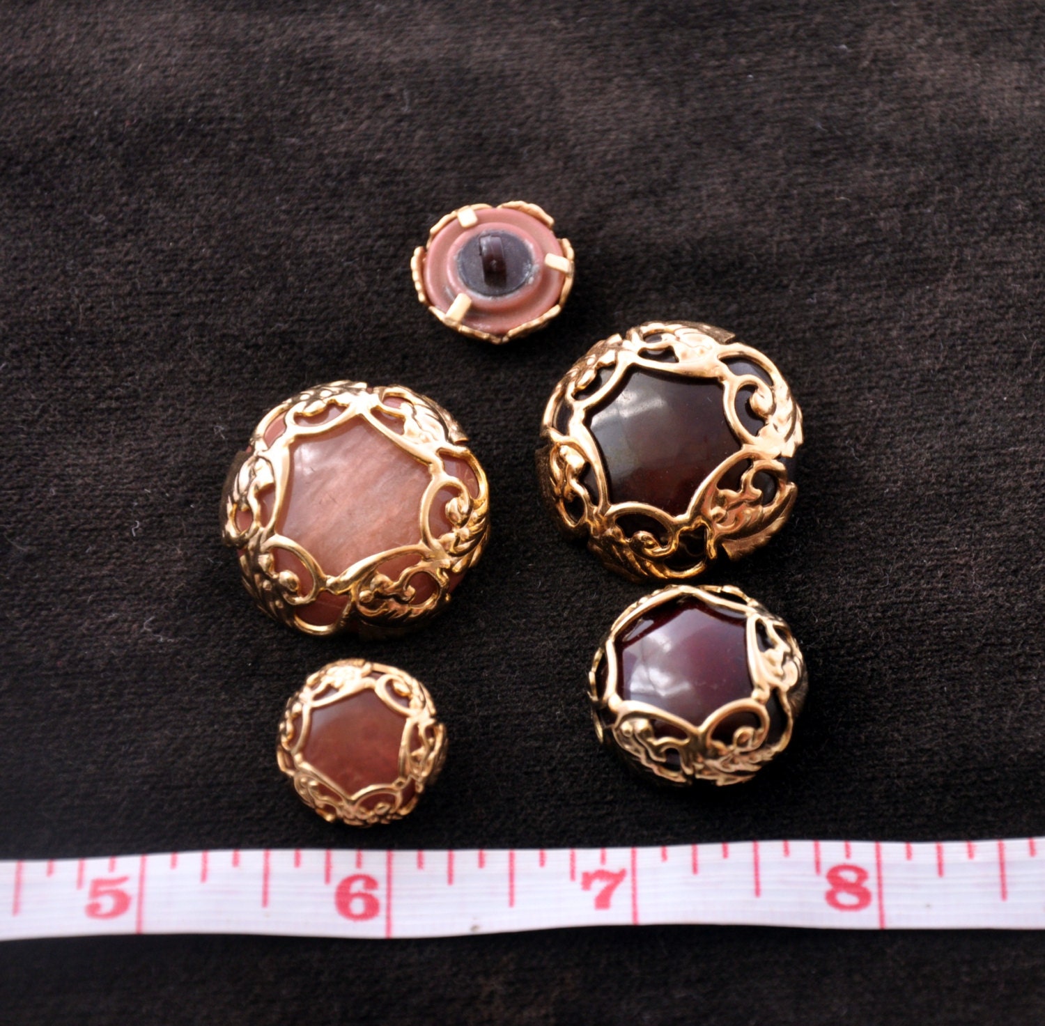 Gold metal Jewelry buttons with pearl effect in The centre from