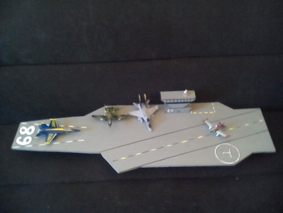 toy aircraft carrier with catapult