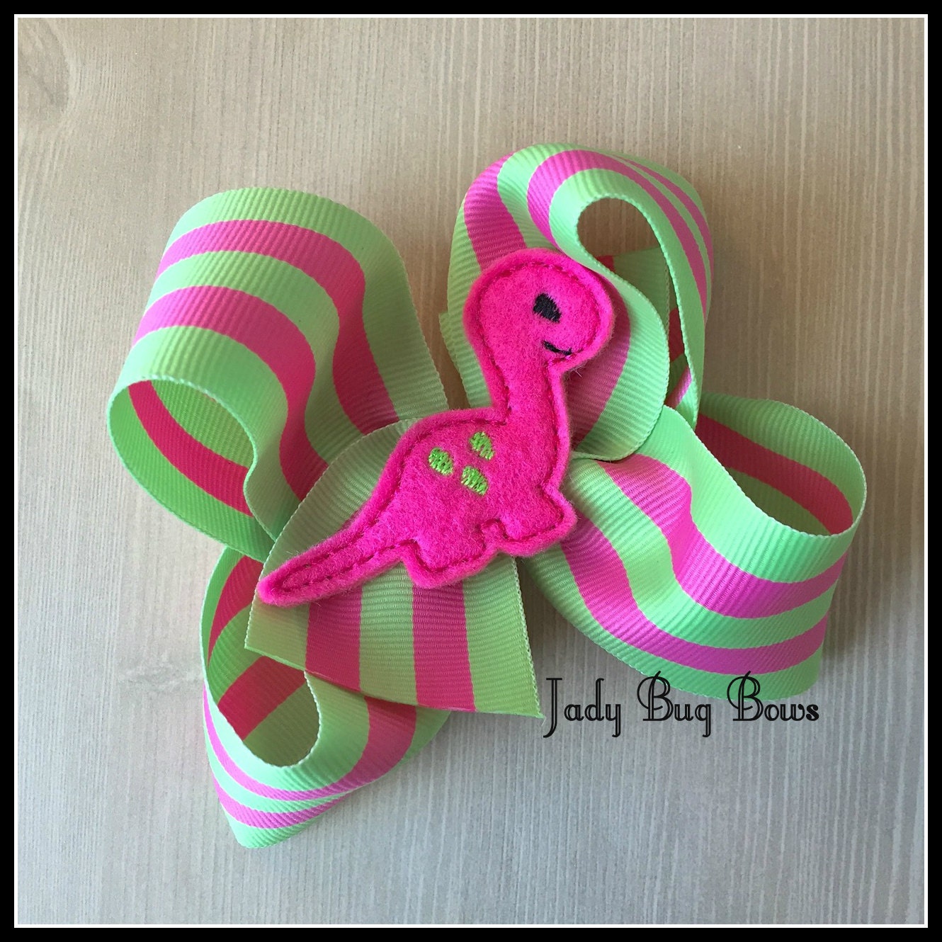 dinosaur hair bow