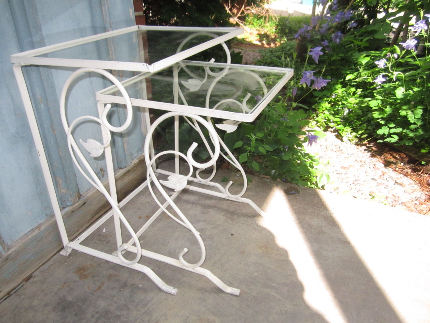 Vintage Set of Two Sturdy Nesting White Metal Glass Top Patio Tables