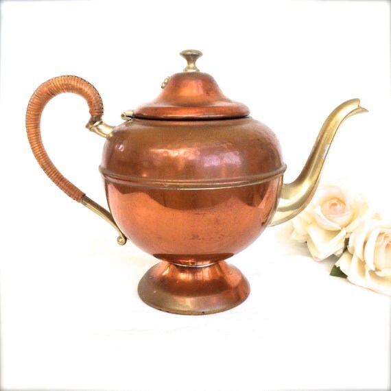 vintage copper teapot with brass spout and ratan wrapped vintage copper teapot with brass spout and ratan wrapped