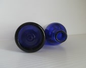 pair of blueberry blue vintage bottles . cobalt bottles . vintage blue bottles . midnight blue glass for decor . trendy decor . cottage chic