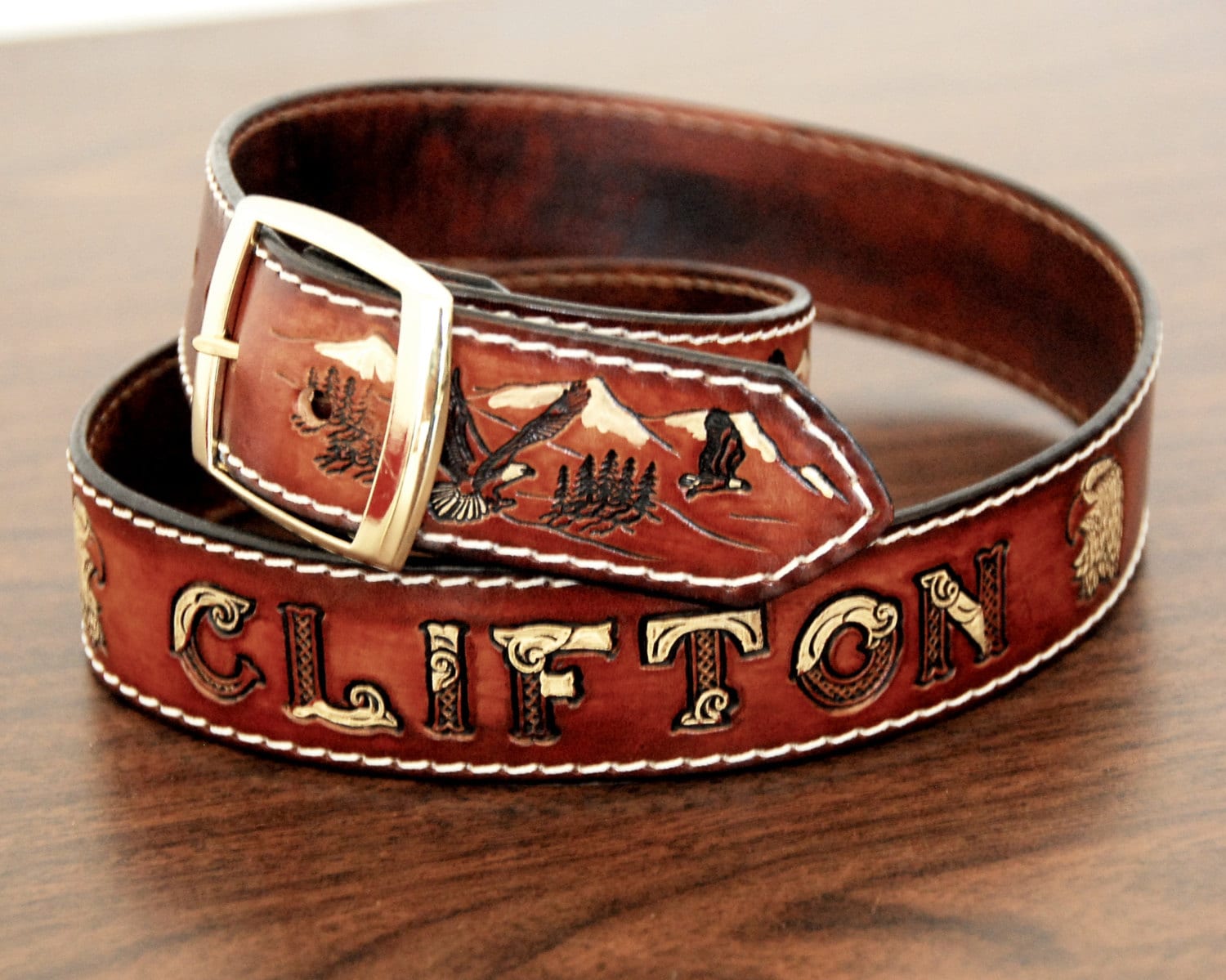 Personalized Leather Name Belt Dark Brown, painted background and white