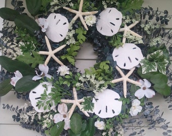Eucalyptus starfish, sand dollar wreath. Made by a stay at home veteran.