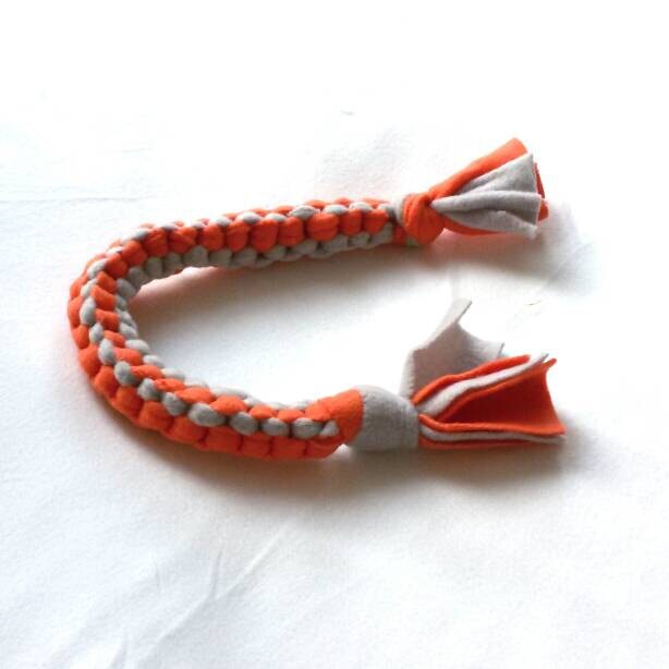 Rope fleece fabric dog toy to chew fetch tug.