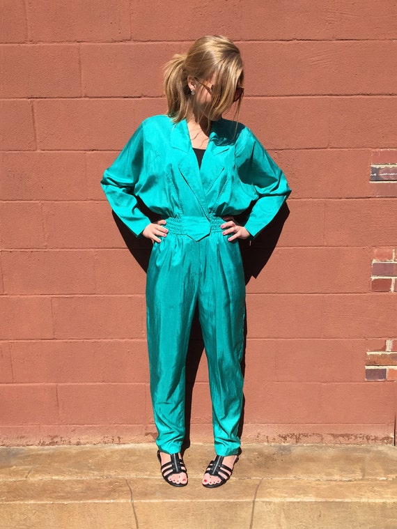 Joan Walters 1980s Turquoise Blue Jumpsuit / by ChapsAndRascal
