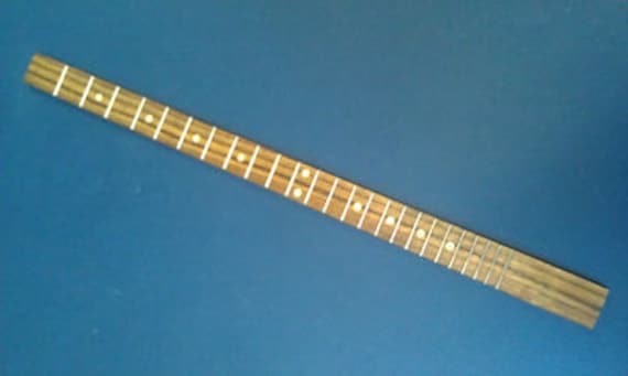 Cigar Box guitar FretBoard complete with frets.