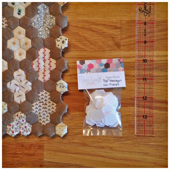 Miniature hexagon paper pieces for dollhouse quilt