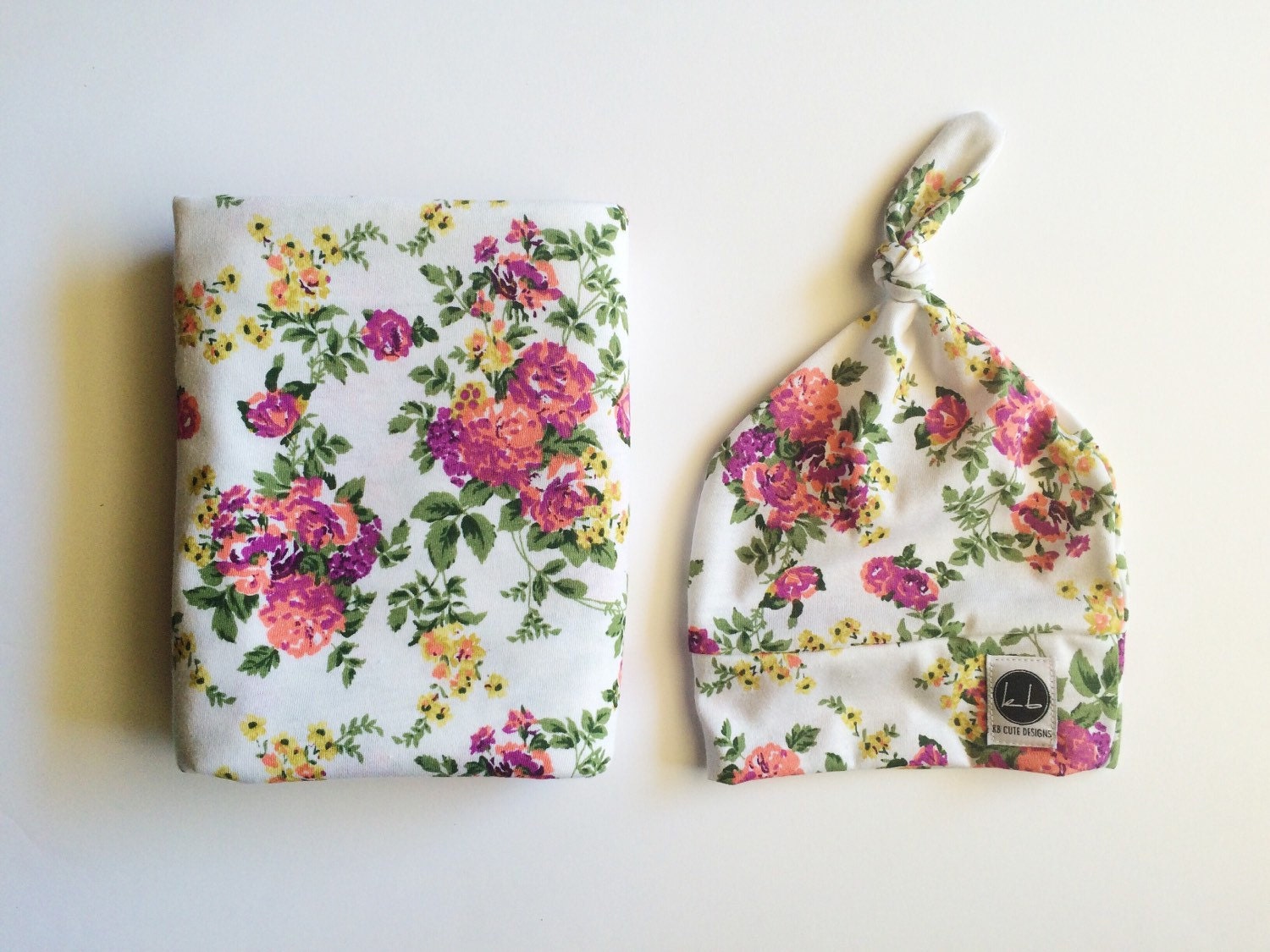 White small floral swaddle and beanie set
