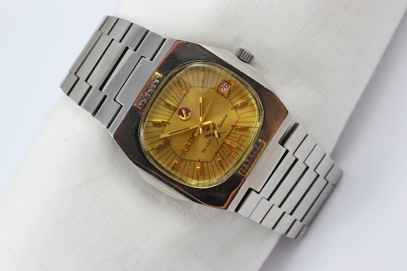 rado silver watch