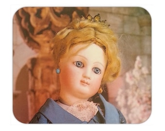 Mousepad. Computer. Accessories. Desk. Antique dolls. Collection of dolls. Mouse control.