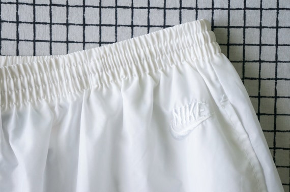 white nike windbreaker pants