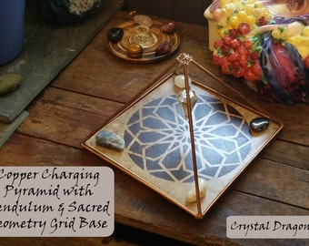 Copper Pyramid with Quartz Pendulum, Sacred Geometry Tile Base, & Crystals with a Drawstring Pouch