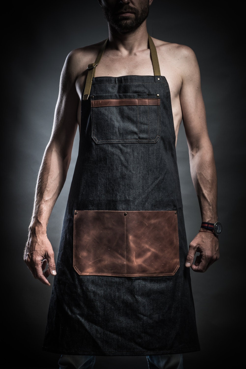 Denim apron with leather pockets and military belts by Kruk