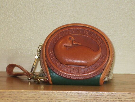 dooney and bourke round purse