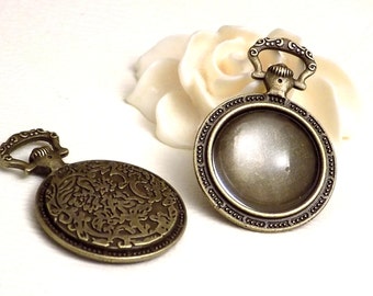 Support cabochon couleur bronze forme montre à gousset + cabochon en verre 20 mm