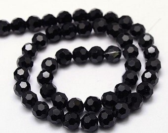 20 perles en verre noires à facettes dimensions 4 mm