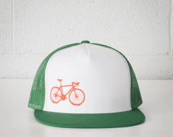 Vital Bicycle - trucker cap, orange on green