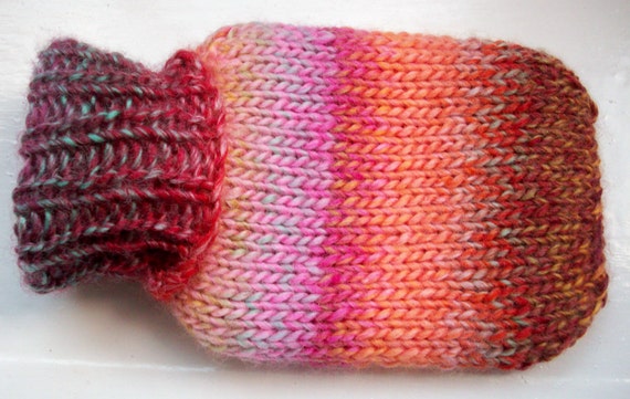 Mini hot water bottle, hand knitted cozy, burnt orange, peach pink, amber raspberry