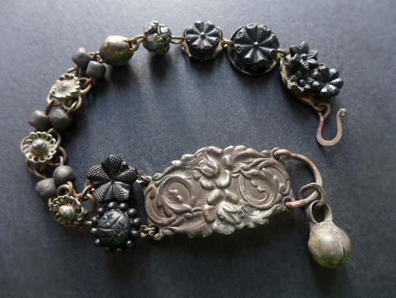 The Waiting Darkness. Rustic assemblage beaded bracelet in black with antique French carved jet flowers. 