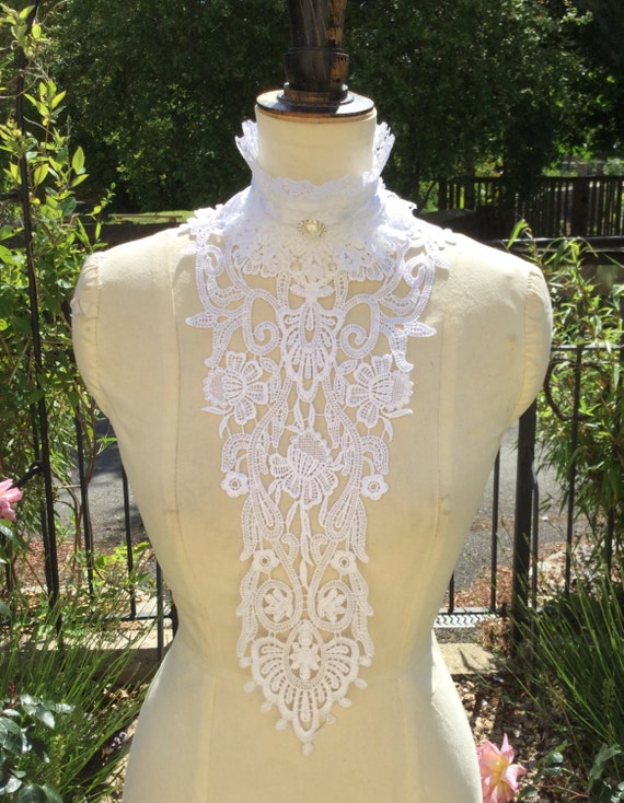 White lace jabot.