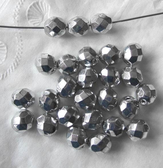 Items similar to 8mm Silver Metallic Crystals 26 crystals on Etsy