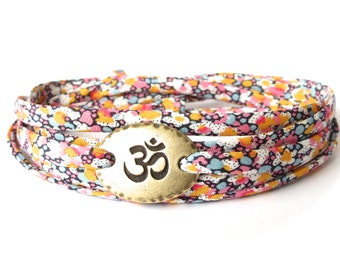 Yoga bracelet, Ohm bracelet with Liberty fabric in orange & pink, meaningful gift for best friend, UK jewellery shop