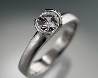 Round White Sapphire Half Bezel Solitaire Engagement Ring in Palladium, White, Rose & Yellow Gold, Platinum, Diamond Alternative