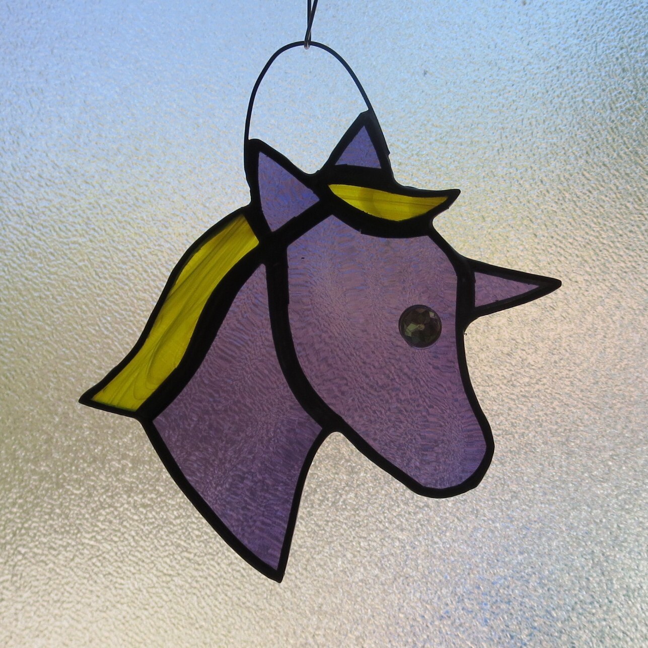 Stained Glass Unicorn Suncatcher in purple by BarbsStainedGlass