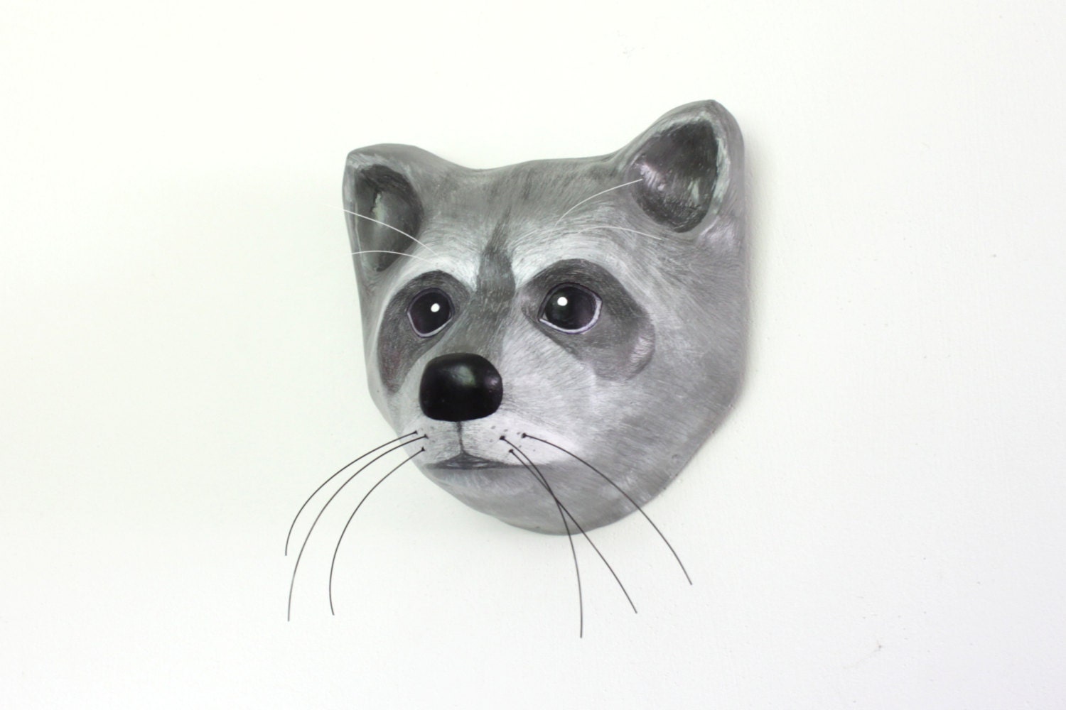 The mask of a raccoon Paper mache wall hanging animal head
