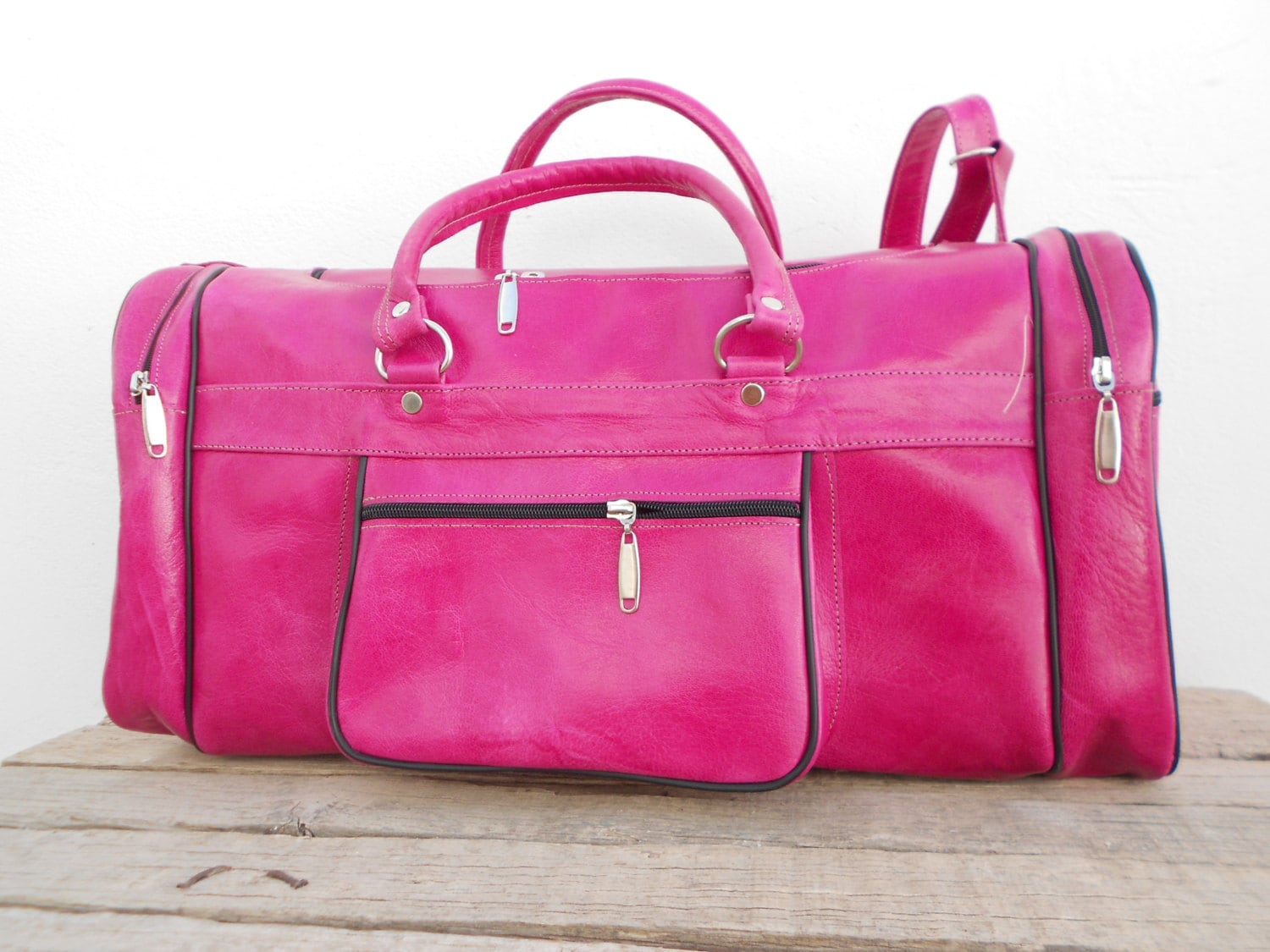 pink leather holdall