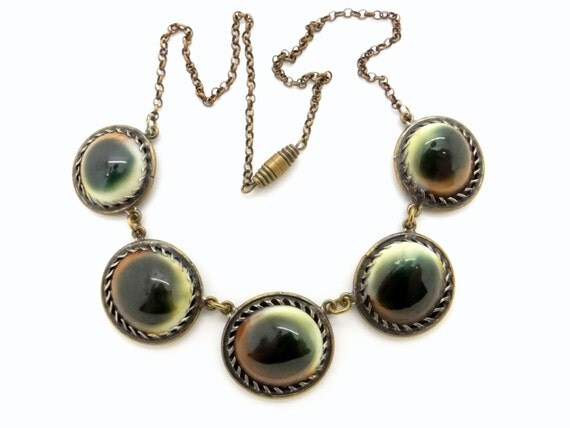 Vintage Operculum Shell Necklace Cat Eye Shell & Brass