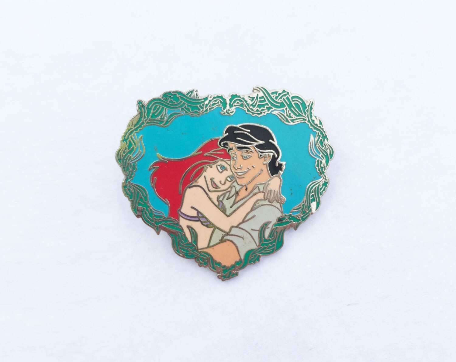 The Little Mermaid heart pin featuring Ariel and by trashedbytime