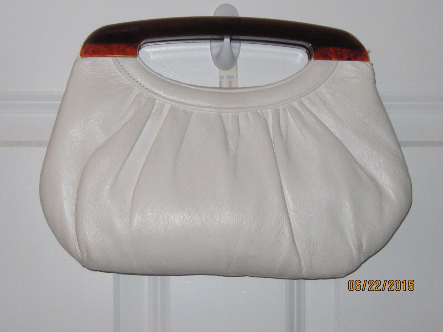 white patent leather purse