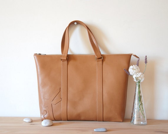 next tan leather handbag