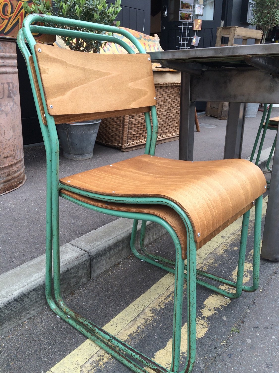 Vintage industrial metal stacking chairs set of 4 Haute Juice