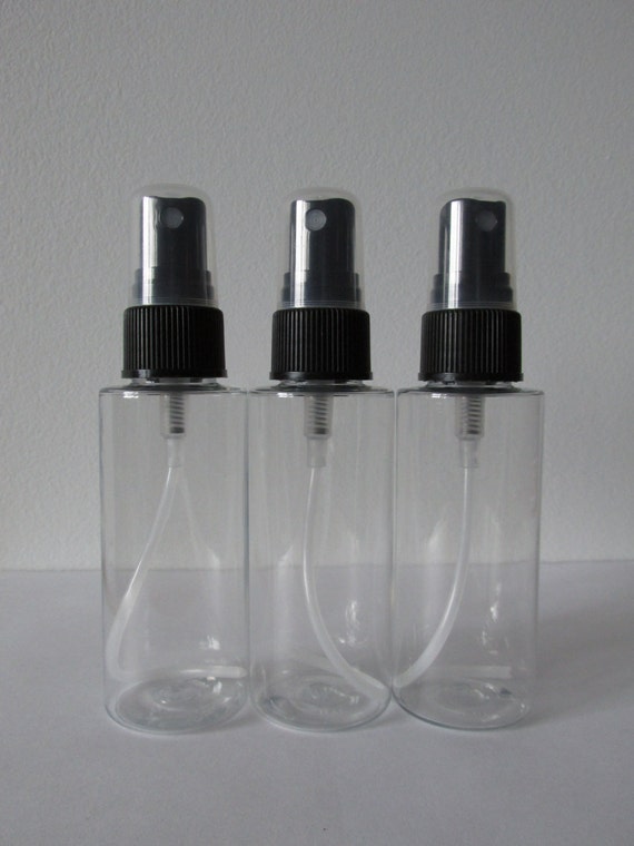 2 oz. ~ Clear Cylinder Plastic Spray Bottles (Black)